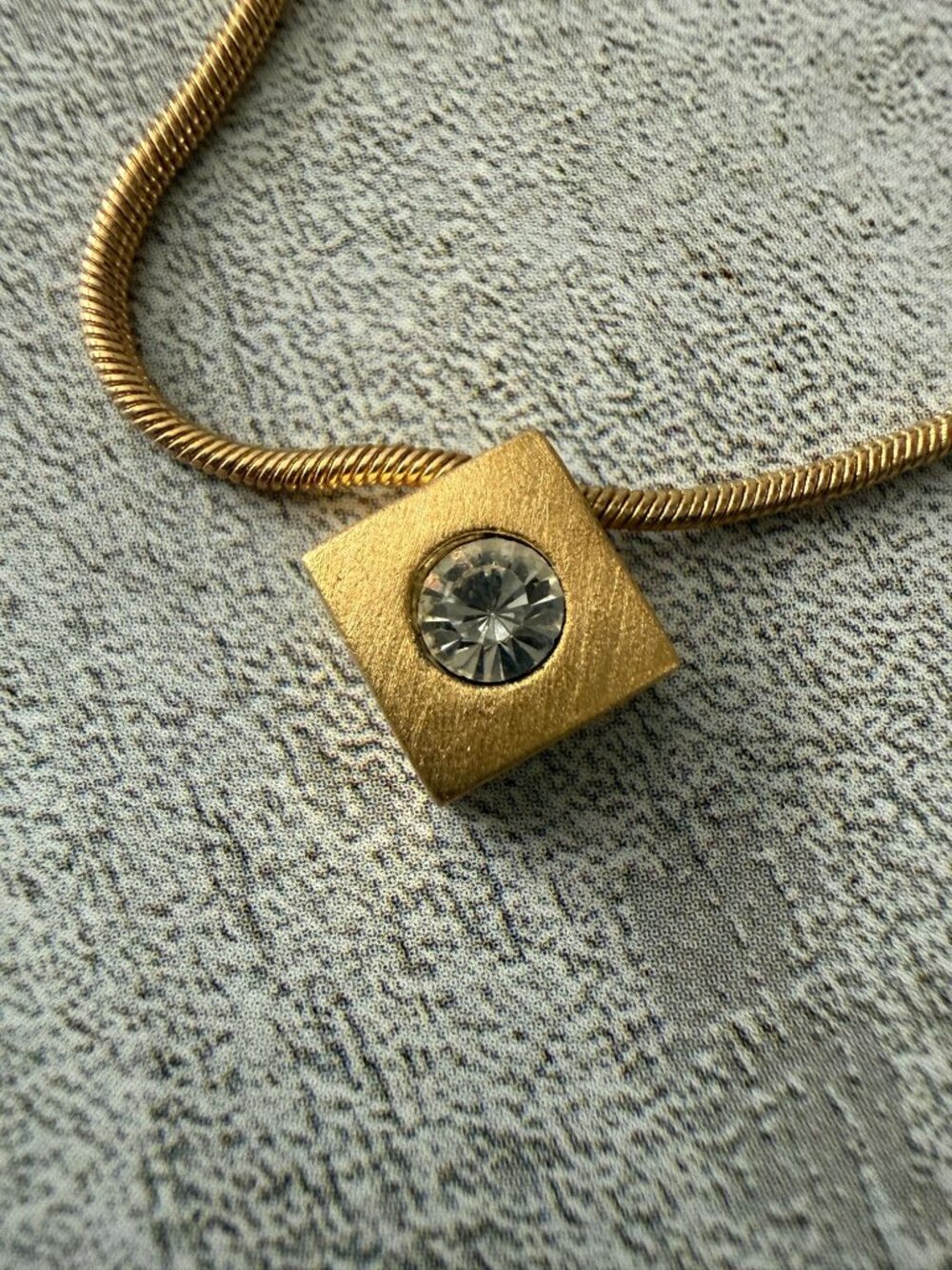 Napier Gold-Tone Snake Chain Necklace Textured Pendant Clear Crystal Accent